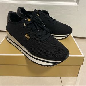 Michael Kors brand new sneakers with box. Never worn.